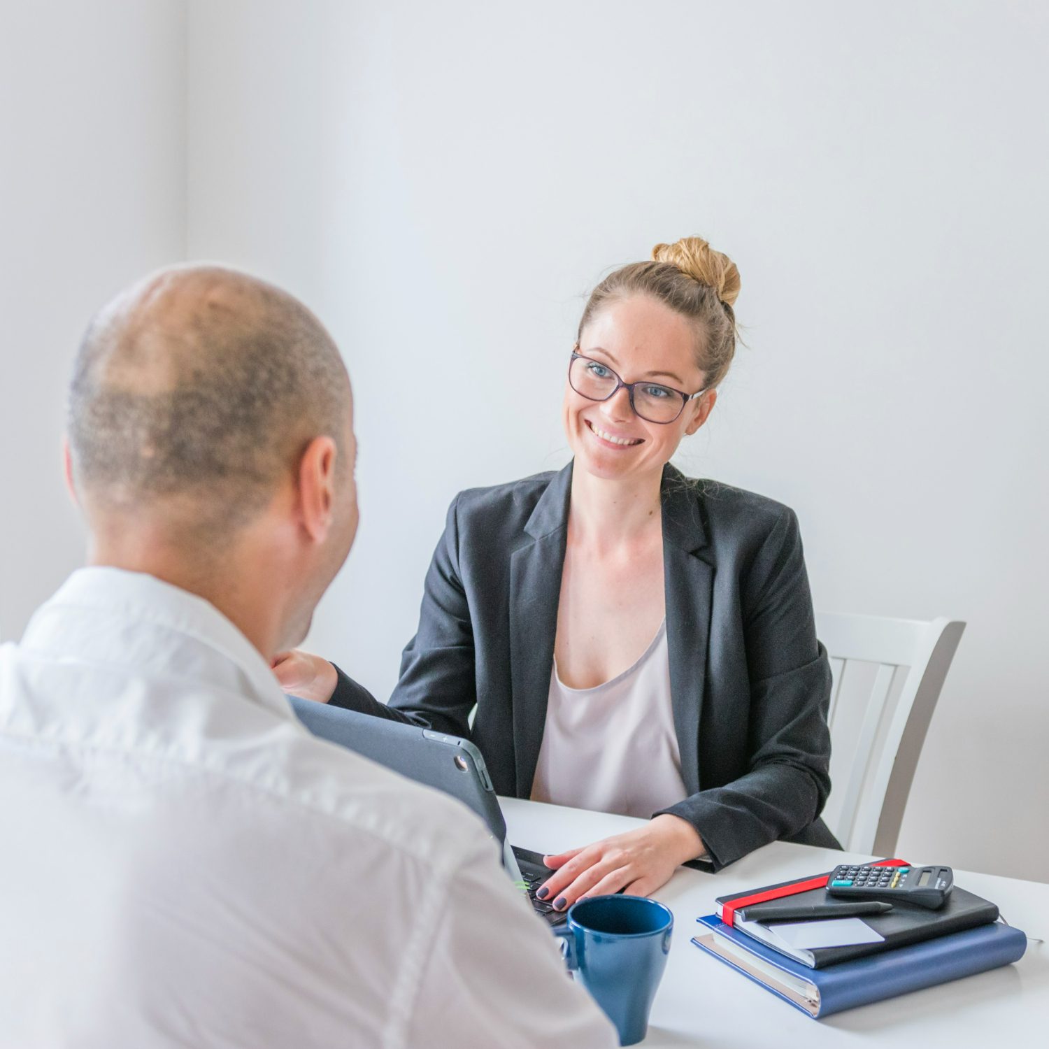 happy-businesswoman-looking-her-partner-office happy-businesswoman-looking-her-partner-office