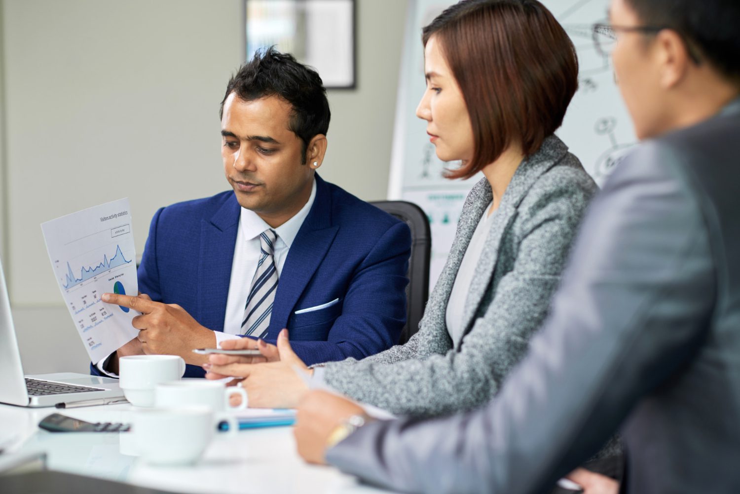 business people working over financial degrees business people working over financial degrees